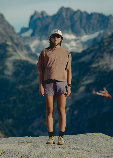 Raide apparel worn in an alpine landscape